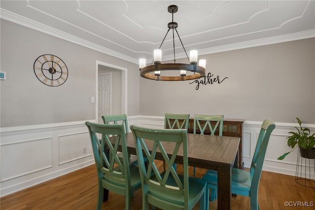 7727 Centerbrook Ct, Chesterfield, VA 23832 - dining room with a chandelier, wood finished floors, ornamental molding, wainscoting, and a decorative wall