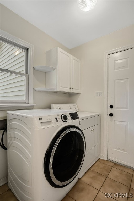 7727 Centerbrook Ct, Chesterfield, VA 23832 - laundry area with separate washer and dryer, cabinet space, and light tile patterned floors
