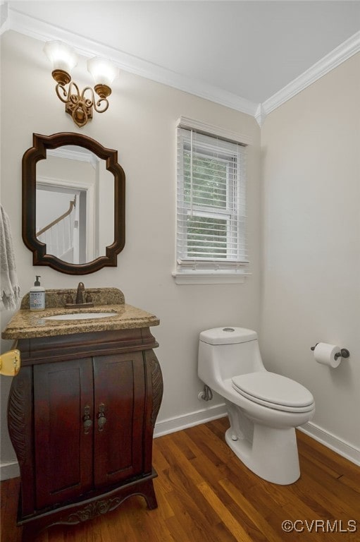 7727 Centerbrook Ct, Chesterfield, VA 23832 - bathroom with ornamental molding, toilet, wood finished floors, baseboards, and vanity