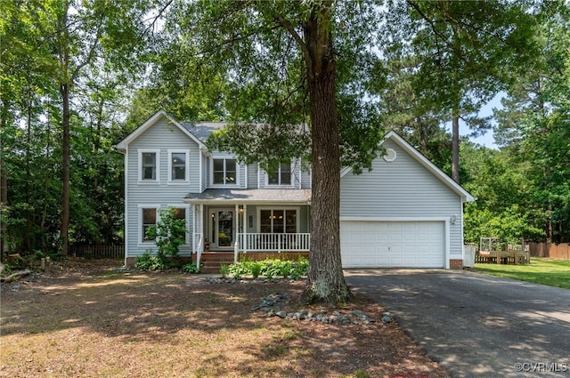 7727 Centerbrook Ct, Chesterfield, VA 23832 - traditional-style house featuring a porch, driveway, and an attached garage
