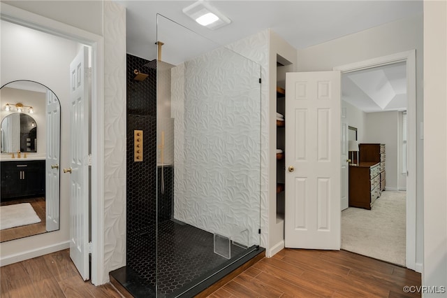 7727 Centerbrook Ct, Chesterfield, VA 23832 - full bath with wood finished floors, a stall shower, vanity, and baseboards