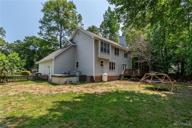 7727 Centerbrook Ct, Chesterfield, VA 23832 - back of property featuring a wooden deck, a chimney, and central AC unit