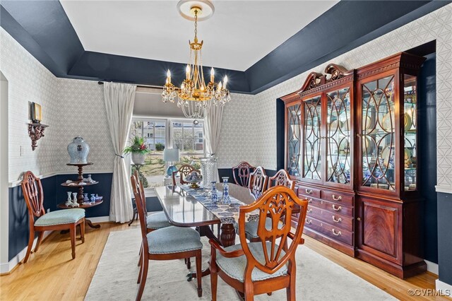 5225 Clipper Cove Rd, Chesterfield, VA 23112 - dining space with a chandelier, wood finished floors, wallpapered walls, and baseboards