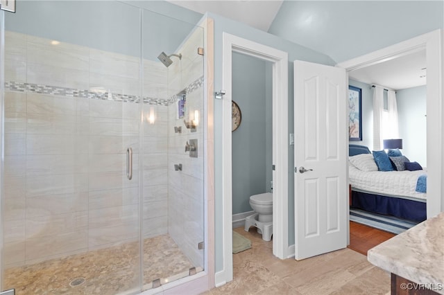 5225 Clipper Cove Rd, Chesterfield, VA 23112 - full bathroom featuring a stall shower, toilet, connected bathroom, and vaulted ceiling