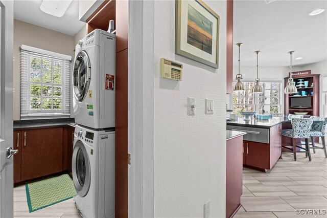 5225 Clipper Cove Rd, Chesterfield, VA 23112 - laundry area featuring stacked washer and clothes dryer, plenty of natural light, recessed lighting, and light wood-type flooring