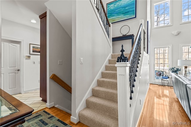 5225 Clipper Cove Rd, Chesterfield, VA 23112 - stairs featuring wood finished floors, baseboards, recessed lighting, and a high ceiling