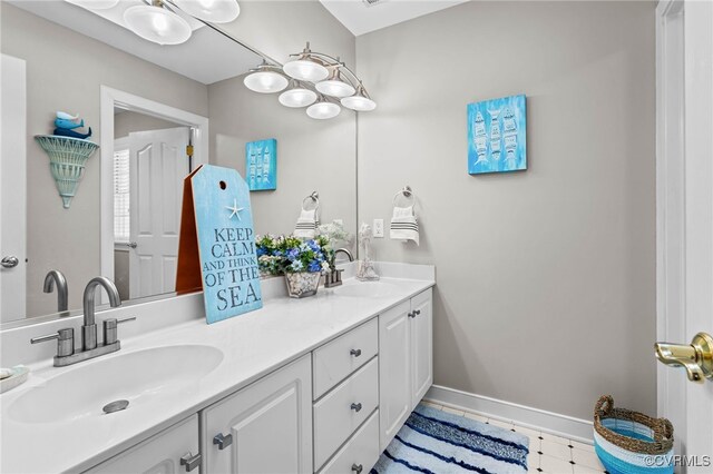 5225 Clipper Cove Rd, Chesterfield, VA 23112 - bathroom featuring double vanity and baseboards