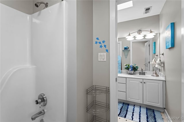 5225 Clipper Cove Rd, Chesterfield, VA 23112 - full bath with vanity, shower / tub combination, and baseboards