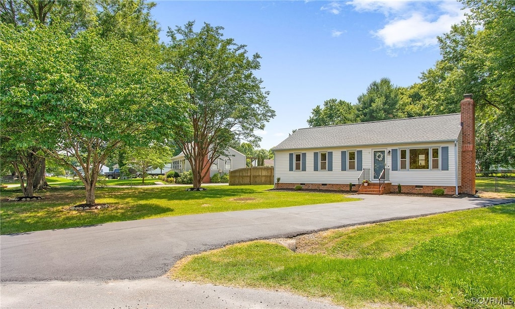 8027 Kerrick Trce, Mechanicsville, VA 23111 - view of front of house featuring crawl space, a chimney, driveway, and entry steps