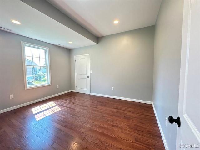 401 N 3 1/2 Ave, Hopewell, VA 23860 - unfurnished room with dark wood-style floors, baseboards, and recessed lighting