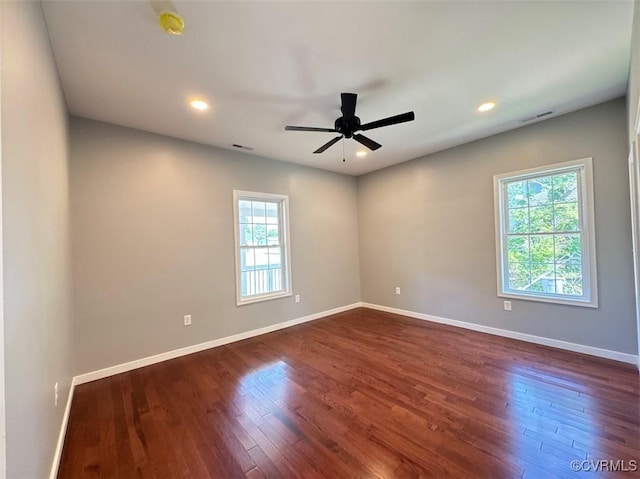 401 N 3 1/2 Ave, Hopewell, VA 23860 - unfurnished room with baseboards, ceiling fan, dark wood-type flooring, and recessed lighting