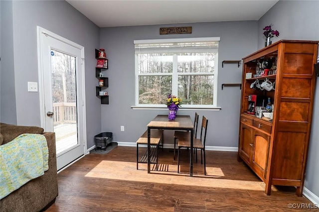 7547 Sedge Dr, New Kent, VA 23124 - dining area featuring dark wood-style floors and baseboards