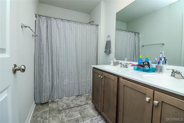 7547 Sedge Dr, New Kent, VA 23124 - full bath with double vanity, stone finish flooring, and a shower with curtain