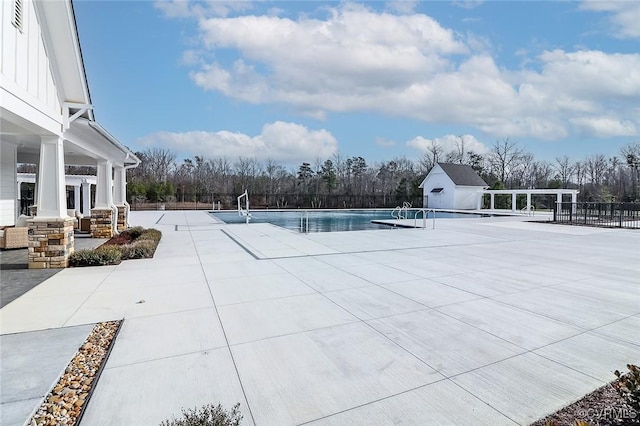 7547 Sedge Dr, New Kent, VA 23124 - community pool with an outdoor structure and a patio area