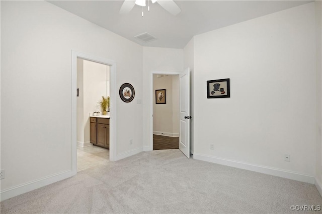 15719 Henningford Rd, Chesterfield, VA 23832 - unfurnished bedroom featuring light colored carpet, baseboards, connected bathroom, and ceiling fan
