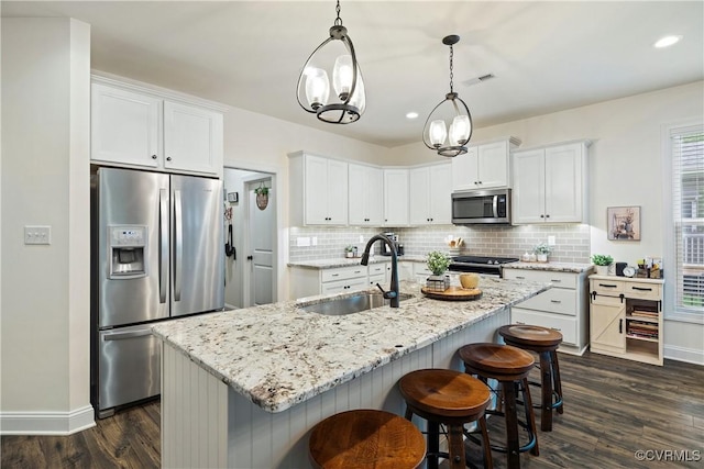 15719 Henningford Rd, Chesterfield, VA 23832 - kitchen with stainless steel appliances, a sink, dark wood-type flooring, baseboards, and recessed lighting