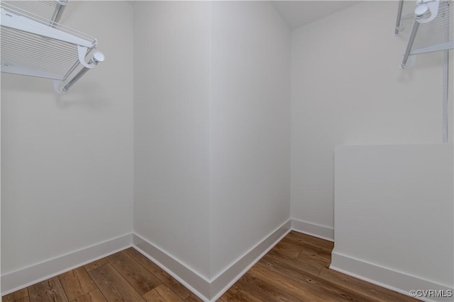5888 Cartersville Rd, New Canton, VA 23123 - walk in closet with dark wood finished floors