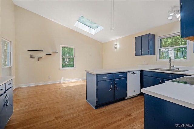 3201 Barnes Spring Ct, Chesterfield, VA 23112 - kitchen featuring a sink, a skylight, dishwasher, blue cabinetry, and light wood-style flooring