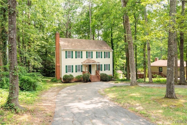 13917 Barnes Spring Rd, Midlothian, VA 23112 - colonial inspired home featuring driveway and a chimney