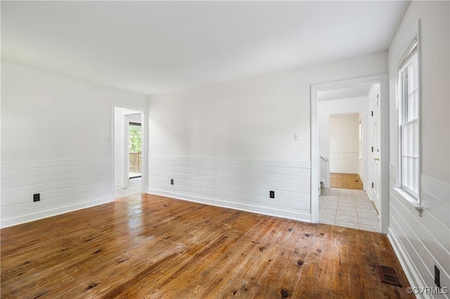 13917 Barnes Spring Rd, Midlothian, VA 23112 - spare room with hardwood / wood-style floors and a wainscoted wall