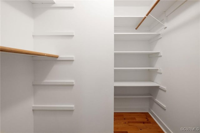 13917 Barnes Spring Rd, Midlothian, VA 23112 - walk in closet with wood finished floors