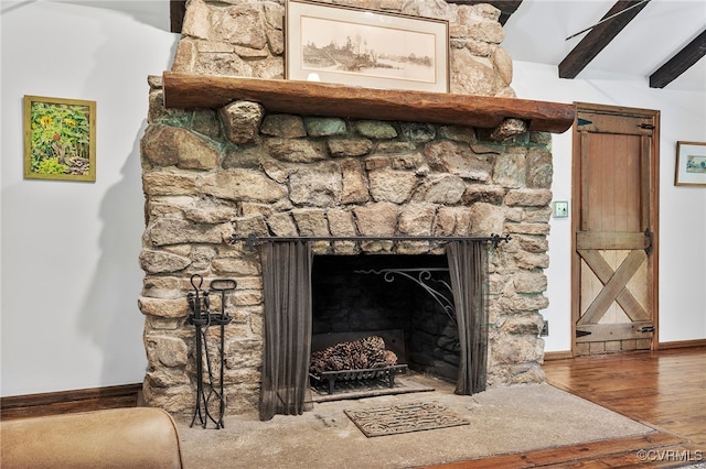 4103 Beechmont Rd, Richmond, VA 23235 - detailed view of a fireplace, wood finished floors, and baseboards