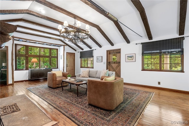 4103 Beechmont Rd, Richmond, VA 23235 - living area with wood-type flooring, a chandelier, and baseboards