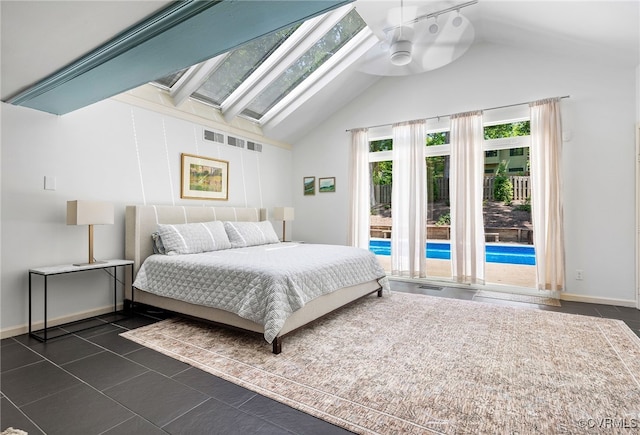 4103 Beechmont Rd, Richmond, VA 23235 - bedroom with access to exterior, a skylight, baseboards, dark tile patterned flooring, and high vaulted ceiling