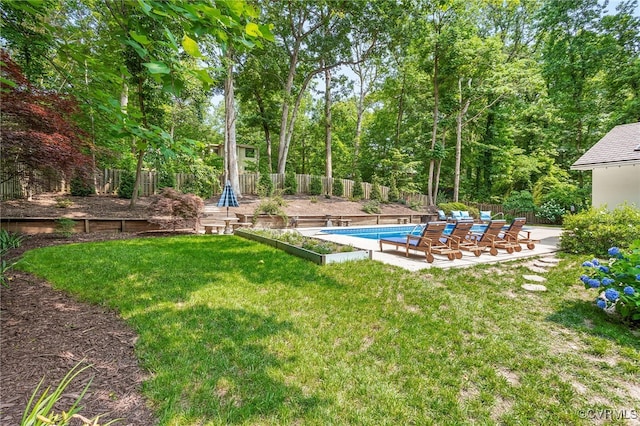 4103 Beechmont Rd, Richmond, VA 23235 - view of yard featuring a patio area and a vegetable garden