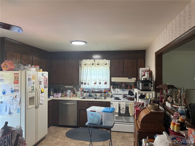 11420 Willow Ln, Disputanta, VA 23842 - kitchen featuring white appliances, a sink, under cabinet range hood, light countertops, and dark brown cabinetry