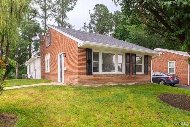 102 Hargrave Ave, Colonial Heights, VA 23834 - view of front facade featuring a front yard and brick siding