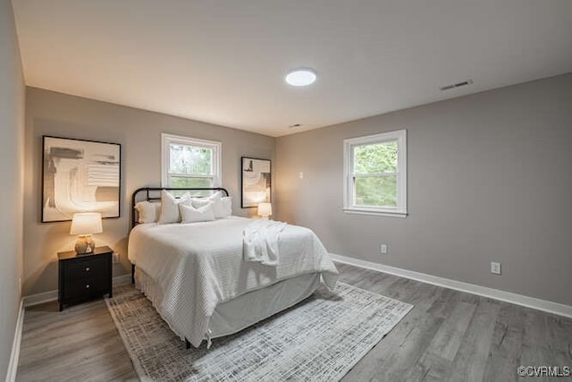 102 Hargrave Ave, Colonial Heights, VA 23834 - bedroom with wood finished floors and multiple windows