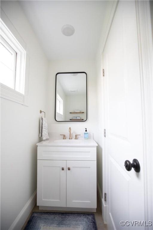 908 High St, Farmville, VA 23901 - bathroom with vanity and baseboards