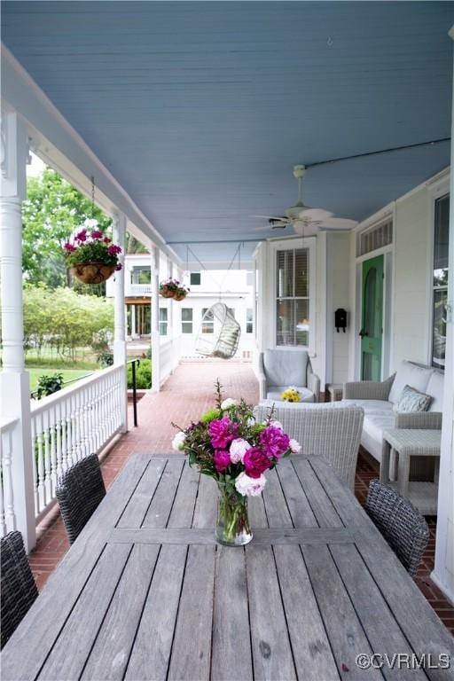 908 High St, Farmville, VA 23901 - wooden deck featuring a ceiling fan, outdoor dining space, and an outdoor hangout area
