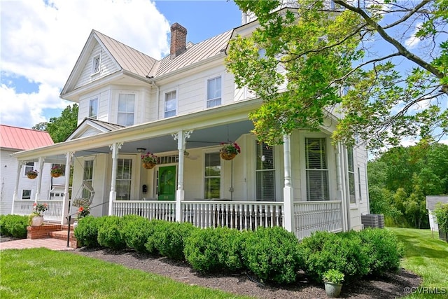 908 High St, Farmville, VA 23901 - view of front of house with a standing seam roof, a porch, metal roof, and a chimney