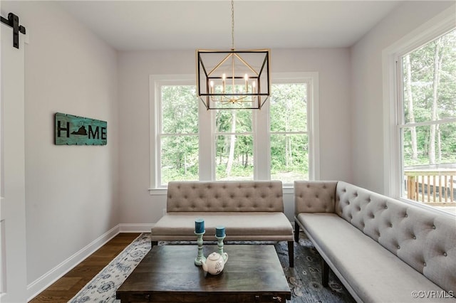 4507 Summer Camp Ct, Moseley, VA 23120 - living room featuring a chandelier, healthy amount of natural light, and dark wood-style floors