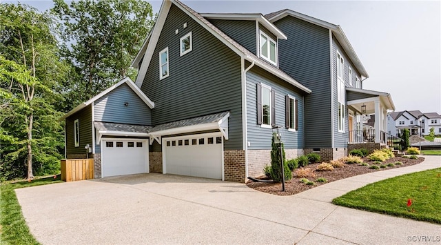 4507 Summer Camp Ct, Moseley, VA 23120 - view of property exterior with driveway, a garage, and a porch