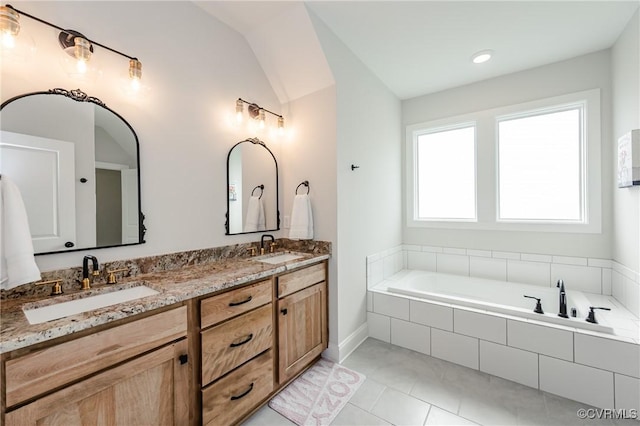 4507 Summer Camp Ct, Moseley, VA 23120 - full bathroom with double vanity, a garden tub, tile patterned flooring, lofted ceiling, and baseboards
