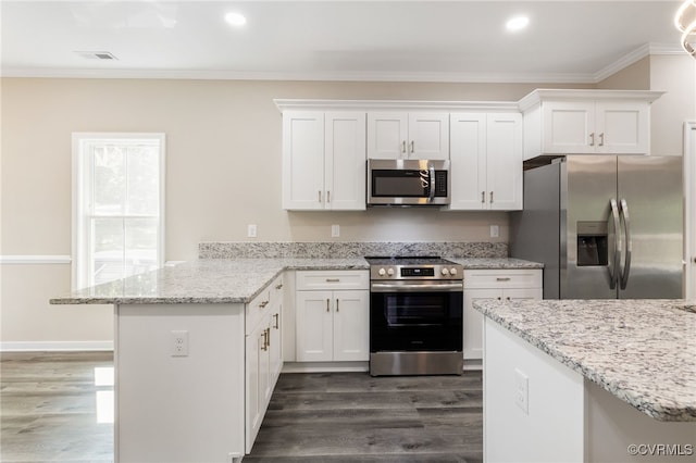 11816 Shady Ln, Chesterfield, VA 23831 - kitchen featuring stainless steel appliances, a peninsula, dark wood finished floors, white cabinetry, and crown molding