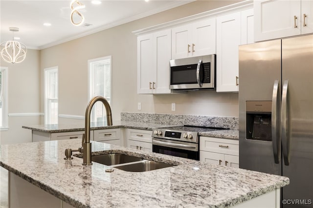 11816 Shady Ln, Chesterfield, VA 23831 - kitchen featuring appliances with stainless steel finishes, a sink, an island with sink, a peninsula, and crown molding