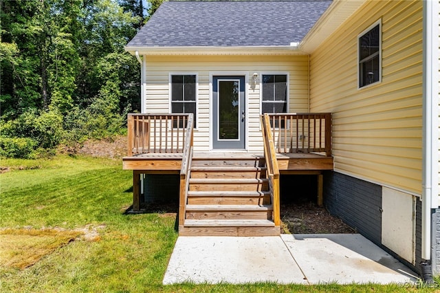11800 Shady Ln, Chesterfield, VA 23831 - view of exterior entry with a shingled roof, a wooden deck, and a yard