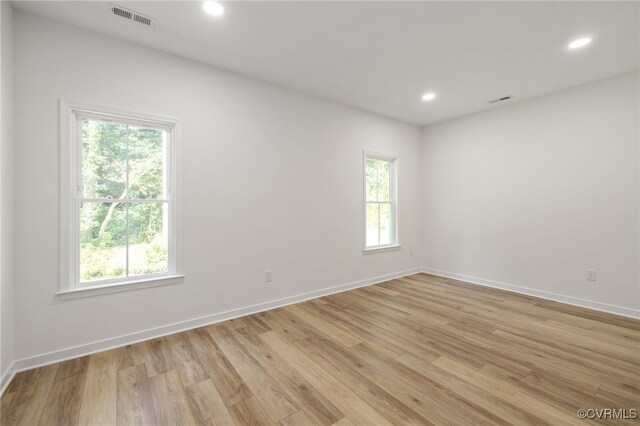 11800 Shady Ln, Chesterfield, VA 23831 - empty room with healthy amount of natural light, light wood-style floors, recessed lighting, and baseboards