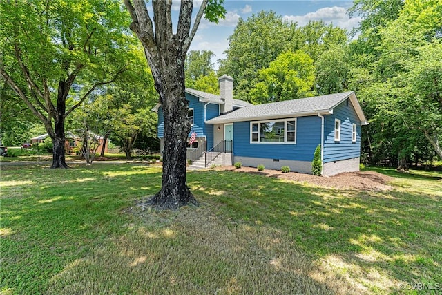 713 Chapman St, Ashland, VA 23005 - split level home featuring a front yard, crawl space, a chimney, and roof with shingles