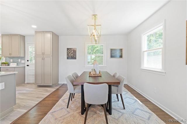 713 Chapman St, Ashland, VA 23005 - dining space featuring light wood finished floors and baseboards