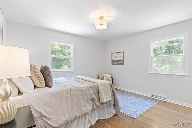 713 Chapman St, Ashland, VA 23005 - bedroom featuring wood finished floors and baseboards