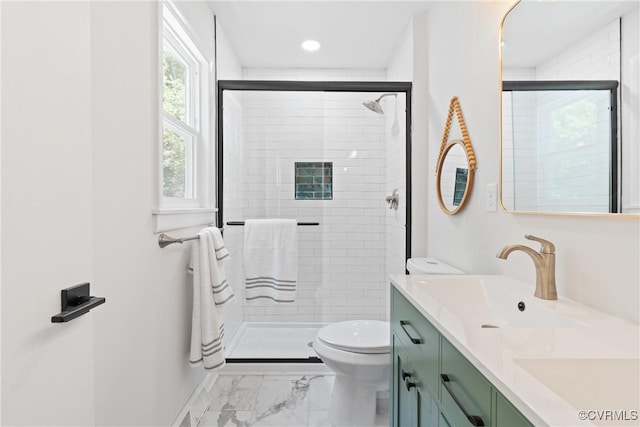 713 Chapman St, Ashland, VA 23005 - bathroom featuring marble look tile flooring, toilet, double vanity, a stall shower, and recessed lighting