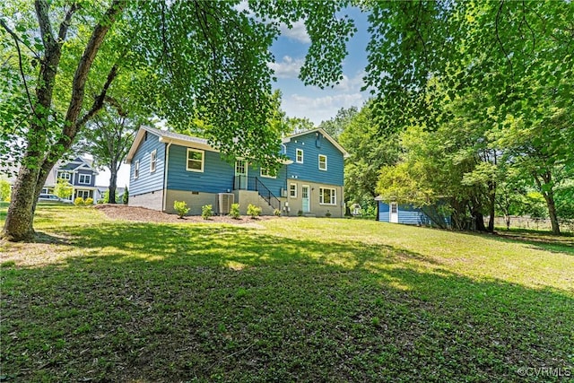 713 Chapman St, Ashland, VA 23005 - rear view of house with a lawn and central AC unit