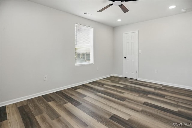1114 Hinton St, Petersburg, VA 23803 - unfurnished room featuring dark wood-style flooring, baseboards, a ceiling fan, and recessed lighting