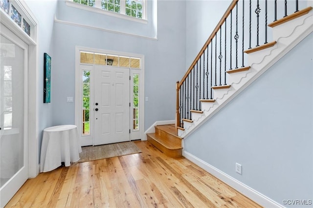 11021 Grub Hill Church Rd, Amelia Courthouse, VA 23002 - foyer with a towering ceiling, wood finished floors, and stairs