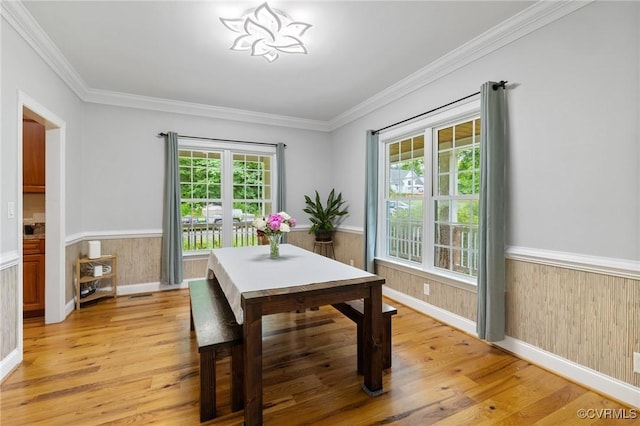 11021 Grub Hill Church Rd, Amelia Courthouse, VA 23002 - dining space with wainscoting, light wood-type flooring, crown molding, and wood walls